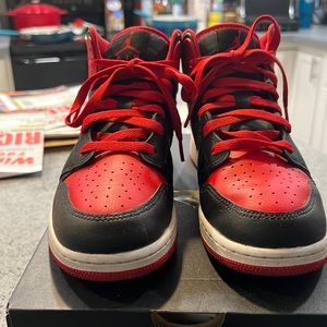 Air Jordan 1 Mid size 5.5youth red and black. Only worn two times.